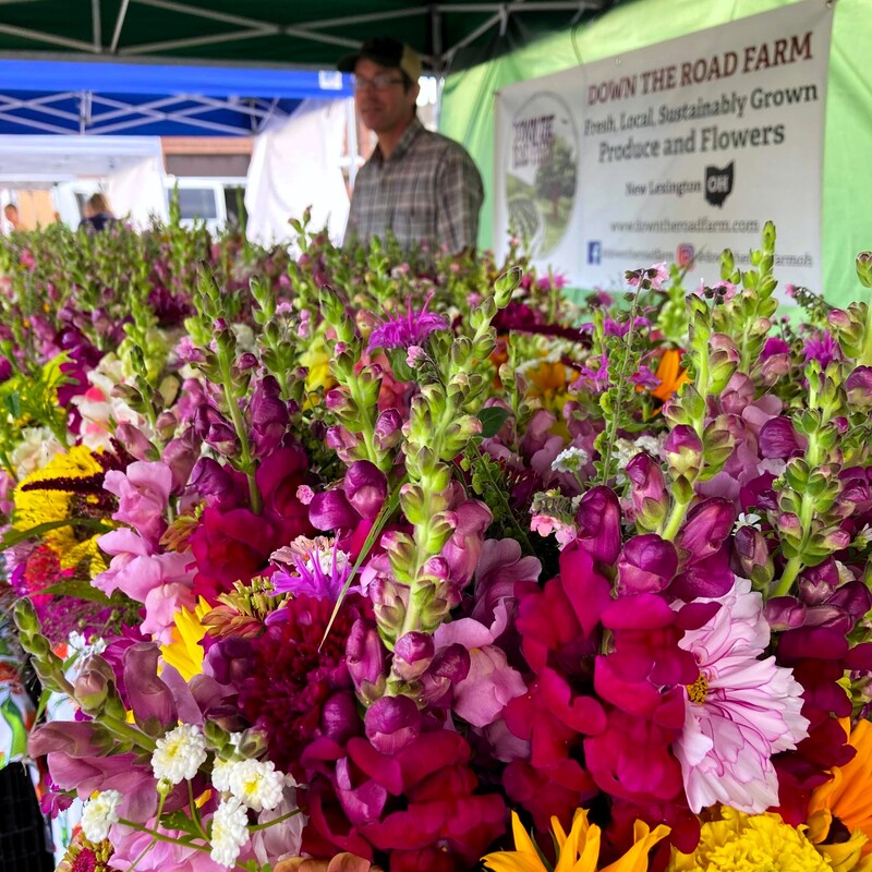 flower farmer with flower bouquets at the Lancaster Farmers Market in Lancaster Ohio